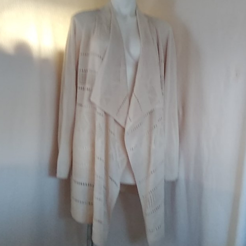 Classy , Cream color. mid -length sweater.